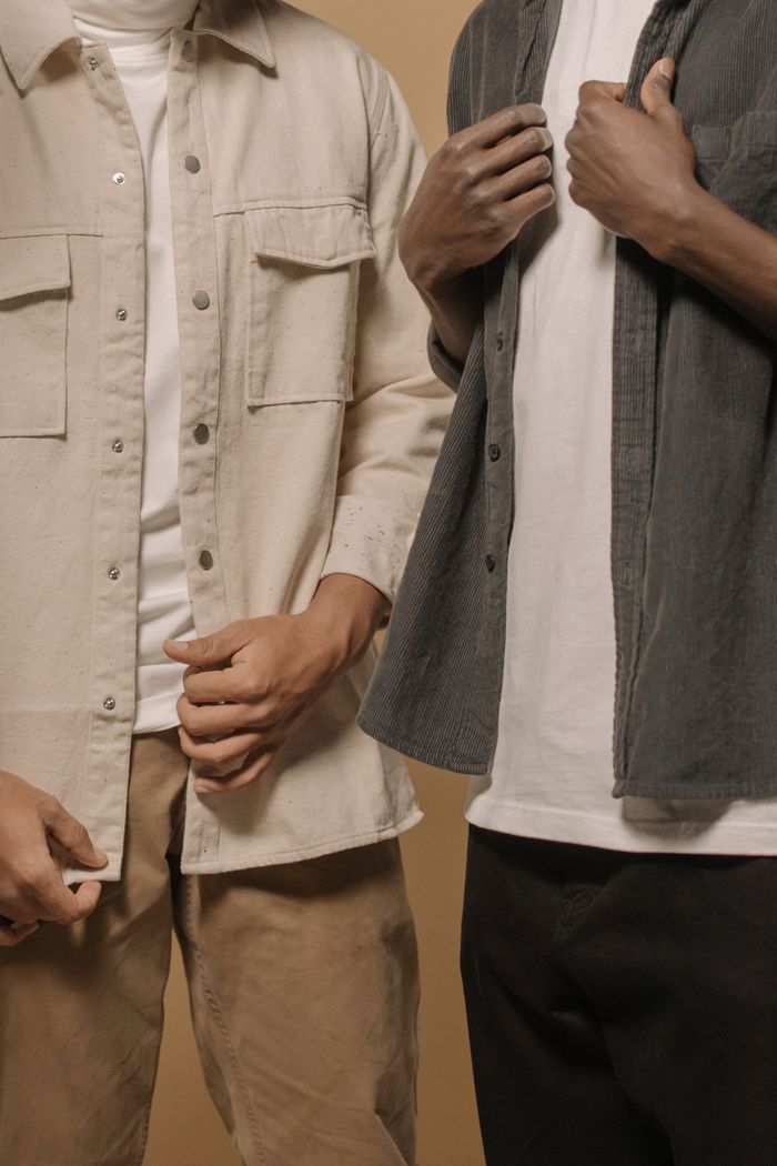 The Art of Drawing Readers In: Your attractive post title goes here Stylish men's casual fashion featuring layered outfits with beige and gray tones.